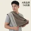Toalla de algodón de clase A, hilo teñido a rayas, gruesa, absorbente, suave, para adultos, para el hogar, venta al por mayor