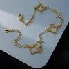 Pulsera de Trébol de Cuatro Hojas con Diamantes Completos Estilo Francés Retro de Lujo Ligero para Mujer con Estilo Fresco Textura Súper Brillante Joyería de Gama Alta Venta al por Mayor