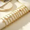 Nuevo Producto Transfronterizo Aogu: Pulsera Minimalista y Única de Cobre con Baño de Oro de 18 Quilates, Incrustación de Circonia y Dijes de Corazón, Ojo y Libélula