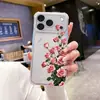 Suministrado directamente por el fabricante, la funda transparente anti-caídas para iPhone 13 Pro Max con patrón de rosa roja romántica se puede personalizar en cantidad.