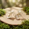 Nuevos pendientes de flor de pétalo versátiles, frescos y suaves, estilo coreano, transfronterizos, juego de varias piezas de Amazon