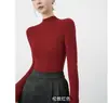 Suéter de cuello alto medio para otoño e invierno, nueva camiseta básica de punto de color liso, top ajustado de rayas verticales para mujer