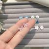 Pendientes de flores dulces con diseño de mariposa y hada, con un temperamento súper elegante y combinable, pequeños pendientes tridimensionales de camelia.
