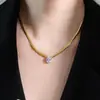 Collar de acero de titanio chapado en oro de lujo ligero y sin decoloración, cadena de clavícula con lazo de moda versátil para mujer, fabricantes