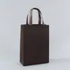 Bolsas de TNT para publicidade, sacolas de compras de vestuário para desenvolver sacolas de TNT revestidas em branco Atacado