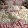 Estilo ins, fresco y simple, juego de ropa de cama de cuatro piezas de algodón puro, diseño de princesa estilo coreano, algodón lavado, estampado floral, ribete floral grande, juego de tres piezas apto para estudiantes
