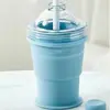 Nueva taza de hielo plegable portátil de silicona con pajita incorporada, molde de taza de hielo de silicona de grado alimenticio para salidas de verano