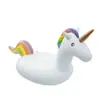 Suministro de fábrica en stock 2 metros flotador inflable de unicornio, PVC inflable niños unicornio inflable montable cama flotante