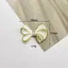 Temperamento Estilo Chanel Accesorios de Joyería en Blanco y Negro con Rosas Aleación con Goteo de Aceite Accesorios de Moño Estrella de Mar Accesorios Sencillos para el Cabello Aretes