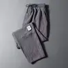 Verão Gelo Seda Novo Linho Calças Casuais Finas Masculinas Perna Reta Etiqueta Estilo Coreano Solto Tamanho Grande Esporte Calças Nove Pontos