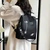 Mochila para Mulheres 2026 Novo Estilo Casual Viagem Antifurto Leve Nylon Versátil Estudante Bolsa Escolar