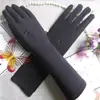 Luvas de seda de leite novas transfronteiriças Luvas para senhoras do Oriente Médio com bordado nos dedos 31cm Mangas de proteção solar fabricantes atacado