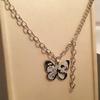 Retro Europeo y Americano Mariposa de Goteo de Aceite Negro Nueva Cadena de Lana de Lujo Ligero de Tendencia Cadena Versátil Collar para Mujer