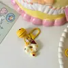 Llavero con Anillo de Campana de Donut de Gato Lindo Campana de Mano para Bebé Llavero de Regalo para Estudiantes Niños