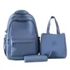 Mochila casual de color sólido simple multicapa de comercio exterior nuevo conjunto de tres piezas para estudiantes de primaria y secundaria
