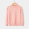 Suéteres infantiles al por mayor transfronterizos para otoño e invierno, cuello medio alto, color liso, tejido suave y cálido para niños y niñas