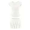 Camiseta de manga corta con cuello redondo, suave y a la moda, de nicho, para mujer, conjunto de dos piezas de falda de tarta de cintura alta, elegante y versátil, verano 2026