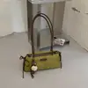 Bolso de axila de nicho estilo francés para mujer, nueva colección otoño/invierno 2026, bolso de hombro casual retro, bolso baguette de alta gama para el trabajo