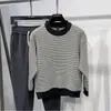 Suéter casual de punto con cuello redondo a cuadros otoño e invierno cálido Suéter slim para hombre Suéter de alta gama para jóvenes hombre