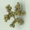Lentejuelas Jiuhong espuma polvo dorado fruta trigémina corazón de bebé estrella adornos navideños accesorios simulación pequeña fruta roja diseño de fabricantes