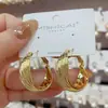 Pendientes de plata s925 con diseño de viento de metal exagerado y personalidad europea y americana, pendientes femeninos de moda con temperamento de aguja de alto sentido.