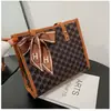 Bolsa feminina grande capacidade 2024 novo estilo coreano bolsa de ombro portátil estampada bolsa feminina moda popular bolsa tote