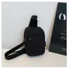 Bolsa Pequeña Casual de Tela de Nylon al por Mayor para Mujer Nueva Simple Ligera para Teléfono Bolsita Deportiva de Nicho Bolso Cruzado de Moda