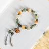 Pulsera de bodhi de flor flotante en polvo natural para hombres y mujeres camelia anillo individual pulsera de mano cuentas cuentas texto placa de juego cuerda venta al por mayor
