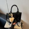 Bolso pequeño portátil popular de este año para mujer 2025 nuevo popular bolso de cubo transfronterizo bolso de hombro bandolera para ir al trabajo