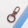 Libro de colores anillo de aleación mascota hebilla de langosta más anillo de tarjeta llavero llavero hebilla de perro hebilla de gancho caja de hardware hebilla de bolsa