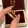 Nuevo Kimono Estilo Chino Anillo de Monedas de Cobre Luz Lujo Vintage Fila Completa de Diamantes Anillo Tesoro Rojo Corindón Rojo Anillo de Serpiente para Mujeres
