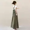 Vestido com Laço nas Costas e Alça Decorada com Botões