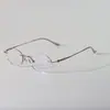 M0053 Nuevas Gafas Ultraligeras Look Natural para Hombre y Mujer Gama Alta Puro Deseo Montura Retro Sin Marco de Titanio Marco de Gafas Fábrica de Danyang