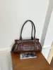 Tendencia Americana Transfronteriza Retro Bolso de Axila para Mujer 2026 Nuevo Pequeño Diseño de Nicho Gran Capacidad Bolso de Hombro Único Portátil