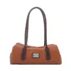 Bolso de Hombro Retro de Nicho Francés para Mujer 2026 Otoño Nuevo Bolso de Bowling Simple de Moda Portátil para el Viaje Diario