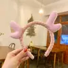 Faixa de cabeça de chifre de Natal mais vendida em todo o mundo, acessório de cabelo fofo de pelúcia com chifre para o Natal