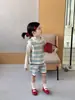 Ropa Infantil Estilo Coreano Otoño/Invierno 2026: Conjunto de Dos Piezas para Niña: Chaleco de Punto Floral Vintage y Shorts