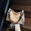 Bolso de Lona Bordado Estilo Chino Nuevo Transfronterizo para Mujer Verano 2025 Nuevo Diseño de Nicho Bolso de Hombro Único para Axila Bolso de Viaje