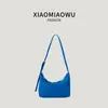 Bolso Hobo Coreano Ligero de Color Sólido para Mujer Versátil para el Trabajo y el Uso Diario Verano 2026 Estilo Perezoso Casual Simple de Mano y Hombro