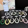Pulseira de celular colorida e estilosa, cordão de pulso, alça de mão curta multifuncional, pingente de chaveiro, nova pulseira de celular