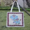 Bolso de lona bordado con hilo de oro por ambos lados de pavo real, bolso de mano con doble asa, bolsa de compras de gran capacidad, nuevo bolso de viaje de estilo étnico