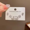 Conjunto clásico versátil de moda de 3 piezas de pendientes japoneses y coreanos con un diseño minimalista y elegante