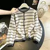 Toma real estilo coreano color contrastante top retro cárdigan mujer 2026 otoño nuevo suéter grueso abrigo
