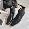 Botas altas largas hechas a mano en Guangzhou, estilo minimalista, de piel de becerro de primera capa, con elevación interior, puntera cuadrada, sin cordones, planas, de moda