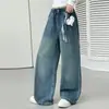 Pantalones vaqueros de primavera y otoño para niña 2026 estilo coreano dulce para niños mayores con diseño de estrella de cinco puntas con lentejuelas plateadas