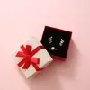 En Stock Caja de Embalaje con Adorno de Lazo Caja de Joyería para Anillo, Pendiente, Pulsera, Pulsera Caja de Regalo con Tapa Superior e Inferior