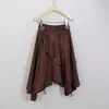 Estilo agridulce Feiyuan con cinturón, falda irregular de color liso para mujer, nuevo modelo de principios de otoño en color café Maillard, minifalda de gamuza