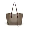 Bolsa de Mano 2026 Estilo Nuevo Lona para Mujer Sensación de Alta Gama Gran Capacidad Bolso de Hombro para Viajero Bolso Grande Equipaje
