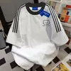 Camiseta de Manga Corta con Cuello Redondo y Empalme de Tres Rayas en Contraste Fresco Retro para Hombres y Mujeres Verano Nuevo Tops Sueltos para Parejas Ins
