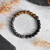 Pulseira de contas de loop único com pedra olho de tigre amarela natural transfronteiriça, vidro preto, pedra de vesícula preta para homens e mulheres, estilo europeu, americano, japonês e coreano